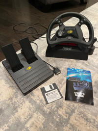 Vintage MadCatz Puma steering wheel and pedal set