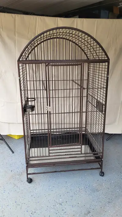 Selling a large USED pet cage. Clean and very sturdy. It has a removable pan for easy bedding cleani...