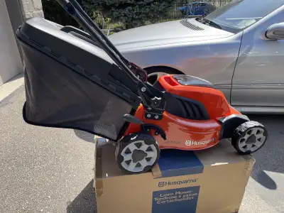 Brand New Battery Lawnmower and Hedge Trimmer Husquvrna. Comes with battery and charger. Great for t...
