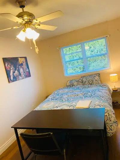 This is a cozy and well-maintained bedroom , perfect for anyone looking for a comfortable living spa...
