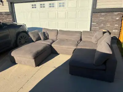 Gently used grey modular from a pet friendly, non smoking house. Removable cushions, and cushion cov...