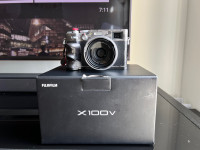 Fujifilm x100v silver (only 800 shots) with $200 worth extra acc