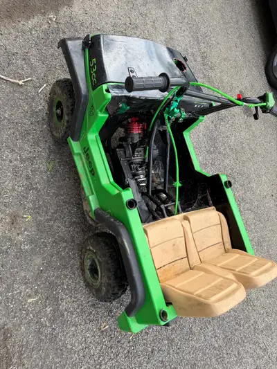 2 stroke 53 cc big bore custom built atv power wheels, runs and drives needs a carb clean. 500$ cash...