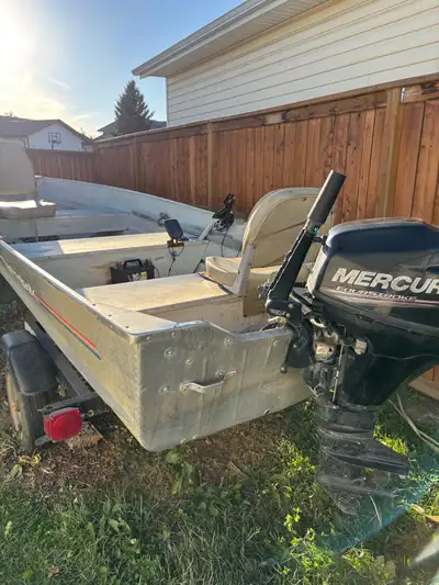 Springbok 14’ 4” tinny with a 4 9-9 horse Mercury motor. Motor only has an estimated 200 hours on it...