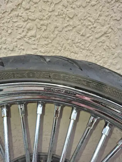 23" spoked wheel. Fits Harley Davidson