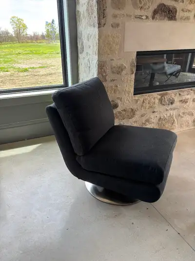 Like new - Modern charcoal grey swivel chair (armless), View more