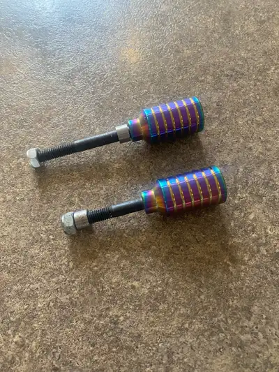 Scooter Pegs. Comes with axle bolts and spacers and nylock nuts. Never used or installed. Brand new.