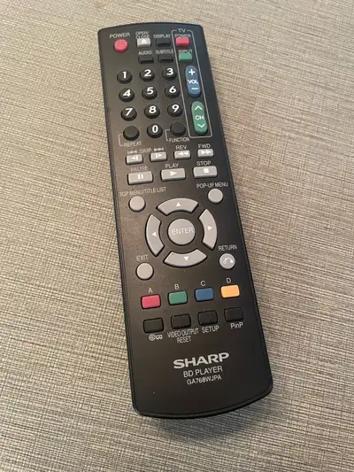 Selling a Sharp remote control for Sharp TV’s, Blue-Ray players, and DVD players, model number GA768...