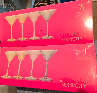 Two boxes. 8 martini glasses in total. Each glass is etched with one of the ladies names. Never used...