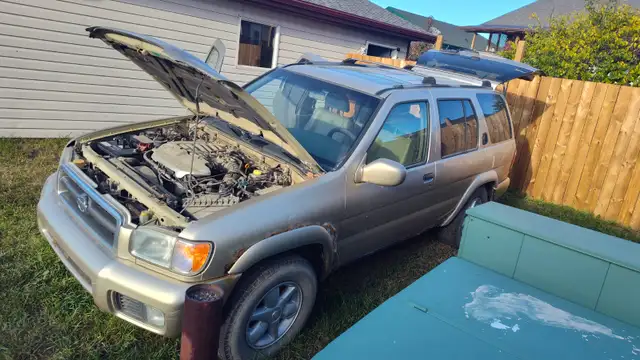 Nissan Pathfinder almost new winter tires!