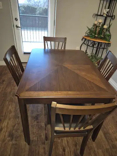 dinning table and 4 chairs., View more
