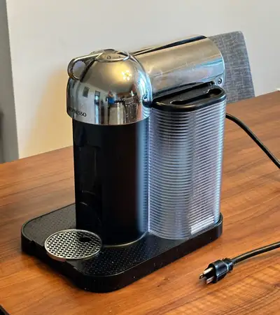 Nespresso Vertuo machine + coffe pods, View more