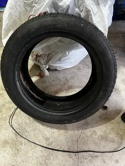 Selling a Uniroyal Tiger Paw Ice & Snow 3 tire. Size is 225/50R17. 9/32 thread (almost brand new) Lo...