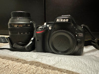 Nikon D5200 with 18-105 VR lens - SC 19K