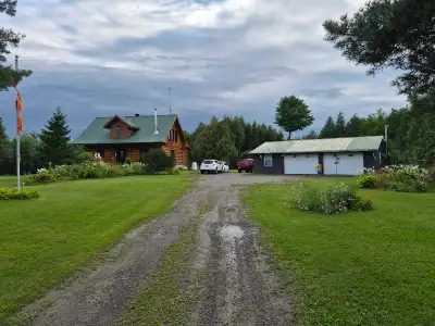 This property encompasses 4.5 acres adorned with mature trees and a variety of fruit trees, includin...