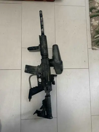 Tippman Bravo one elite paintball gun with upgrades Only been used twice. Comes with -98 CFS/RT ADAP...