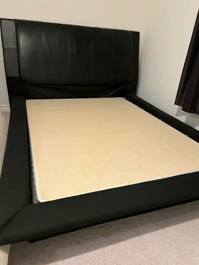 Good condition queen sized bed frame. Can fit king sized mattress.