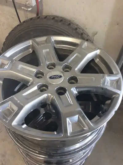 For sale a set of four used chrome 6 hole rims for a ford f150 asking $400 OBO