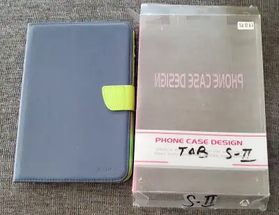 Protective tablet case for Samsung Galaxy Tab S2 8.0. Case is blue on outside with green inside. Has...