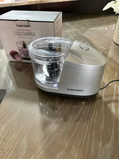 Electric food chopper 1.5 cup, chops anything very sharp blade Retails between $30.00-$35.00 else we...
