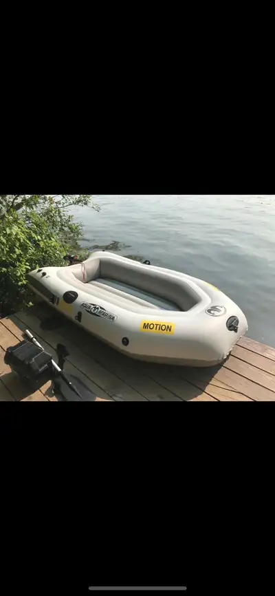 Like new inflatable boat with motor and battery Comes with everything! Pump, oars, water resistant b...