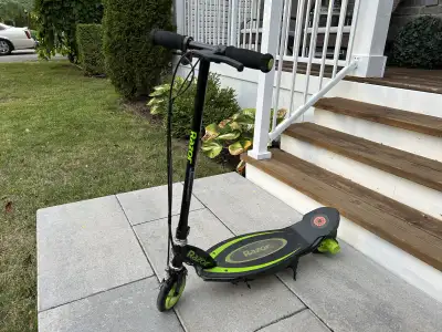Selling a Razor Power Core E90 electric scooter, black/green. Fun and easy way to get around. Speeds...