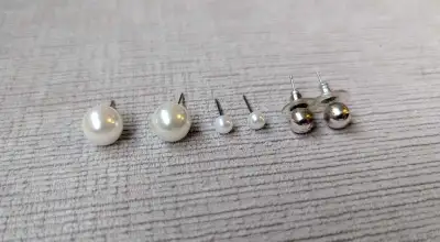 Three Pairs of Earrings , View more