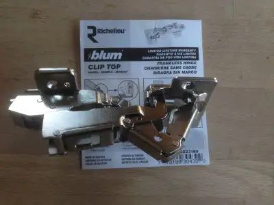 Blum "clip top" frameless hinge with 170 degree opening; ideal for a bifold corner cabinet door in a...