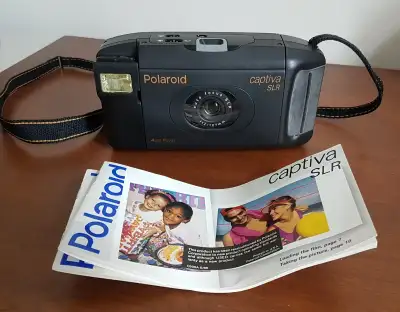 CAPTIVA POLAROID CAMERA, View more
