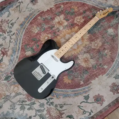 Made in Monmouth County, NJ, USA 2013. Alder body in Gloss ebony. Elite Gamma Maple neck with Crotch...