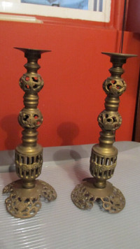 Set of 2 antique brass candle holders 9.5" high.