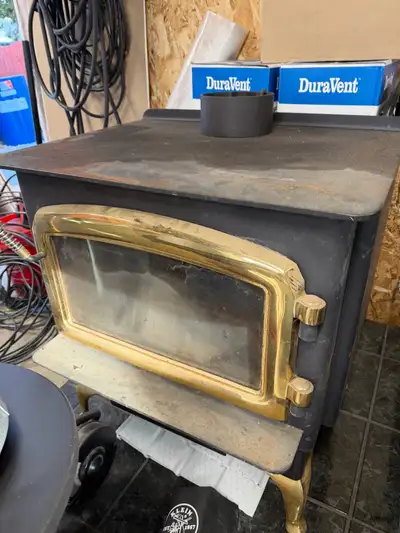 Great condition free standing stove. -Regency 2002 large stove -brand new bricks not installed - 8’...