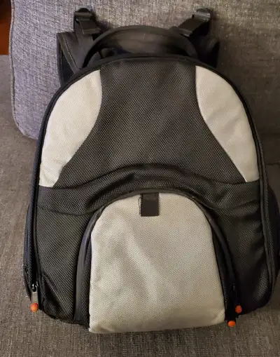 Durable BLACKS backpack. Black and gray color. Has adjustable shoulder straps and a padded back for...