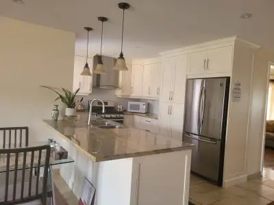 Detatch house 2 bedrooms 1 living and 2 parking for rent