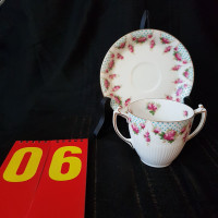 Antique Royal Doulton Double-Handled Teacup and Saucer