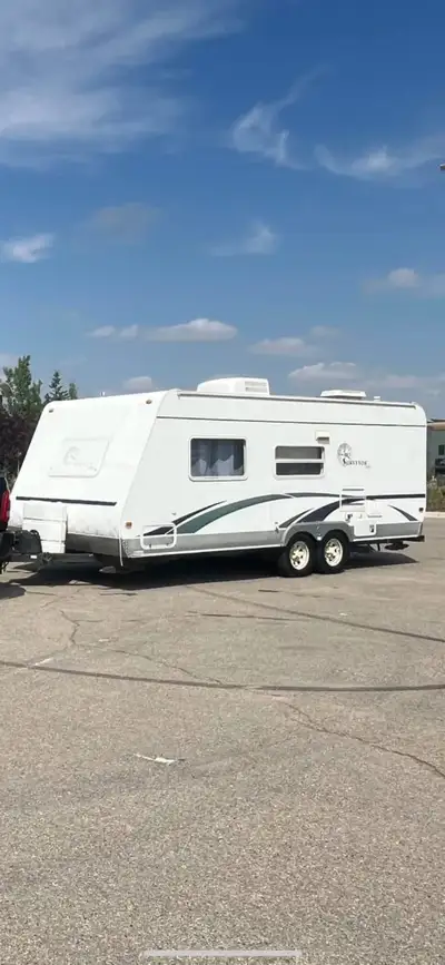2005 Forest River Surveyor camper trailer. 24 foot overall length, 20 foot body length. New tires an...