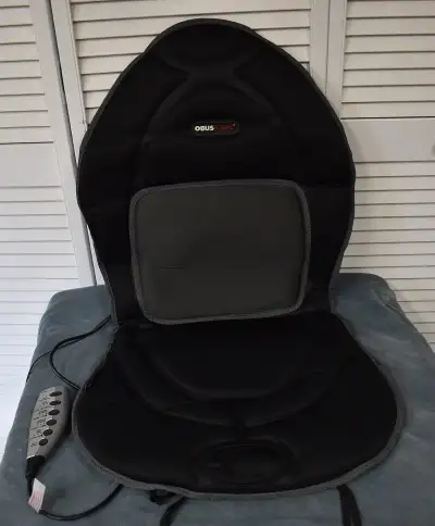 ObusForme Personalized Comfort Driver’s Seat Combines the comforts of heat, 6 massage motors and inf...