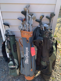 3 bags of golf clubs