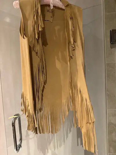 homemade size small leather tassel vest , View more