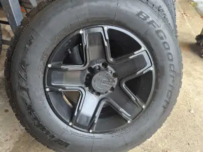 BF Goodrich Winter TA used two seasons on 6 bolt black MAMBA rims. 265/70R17. Fit Sierra, Silverado...
