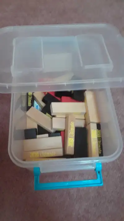 blocks, specialty dice, and container included. (container far better than cardboard box which is he...