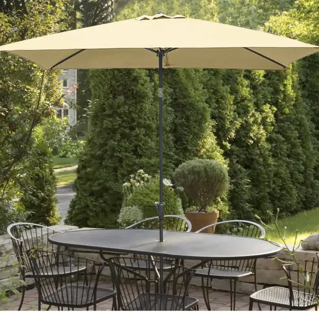 New / display item rectangular umbrella 10ft x 6.5 ft $80 firm