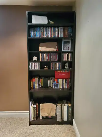 Gently used black IKEA Billy bookcase - Dimensions: 80 W x 28 D x 202 H cm - kept in a sparcely used...