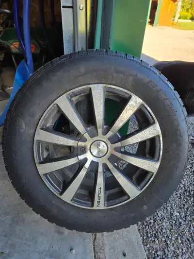 BF Goodrich winter tires and alloy rims. Only used one season. 215/65 R65. Came off 2010 Subaru Fore...