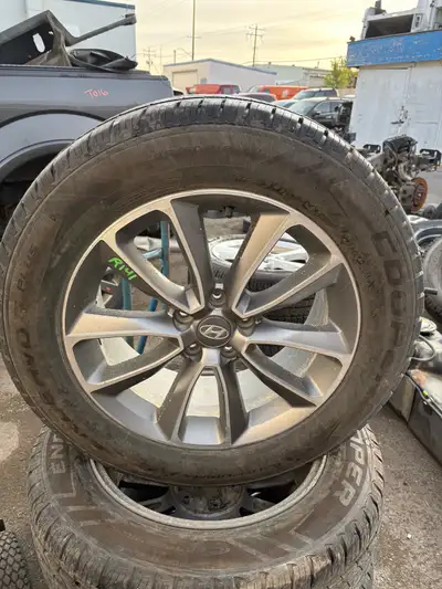 Set of four with cooper tires approx 75% tread