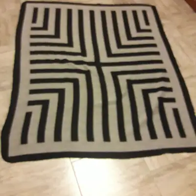 Black/Gray Ladies Scarf -reversible pattern -very good condition -dimensions approximately: 48 inche...