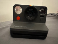 Two pack vintage Polaroid now and instax 12 mini