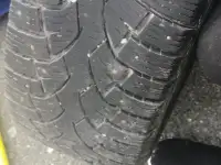 3 studded 225/66/17 tires in good condition lots of treat left