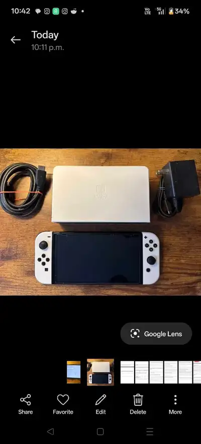 Nintendo Switch OLED Blanche – Très bon état, View more