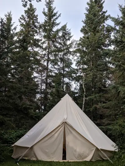 Tent is available until ad is taken down Canvas Tent - ~14' diameter - has wood burning stove with c...